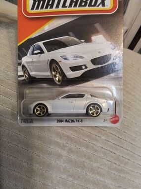 Match 2004 Mazda RX-8 Die-Cast Toy Car - White with Gold Wheels